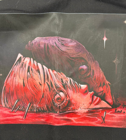 Rei in red tote bag